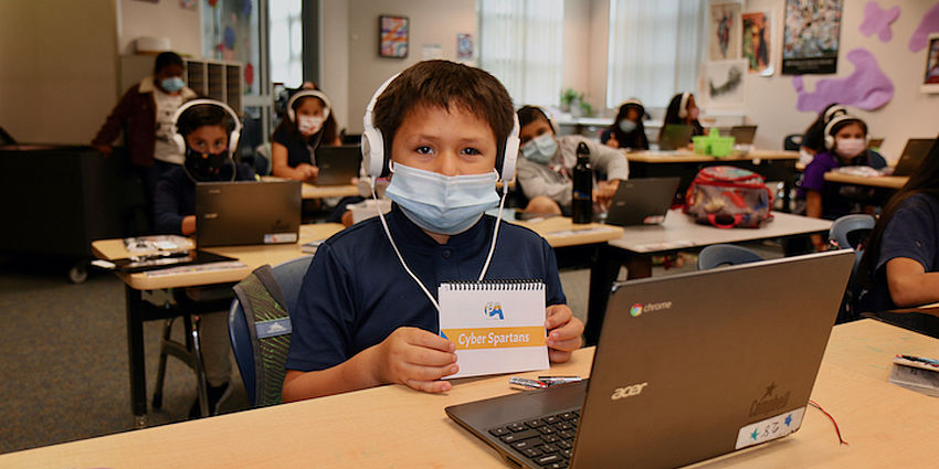 Rosemary CyberSpartan students with laptops