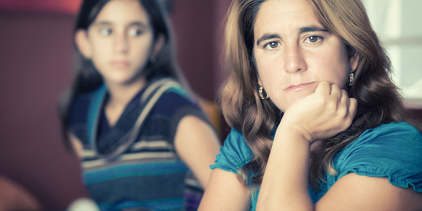 mom looking worries about daughter